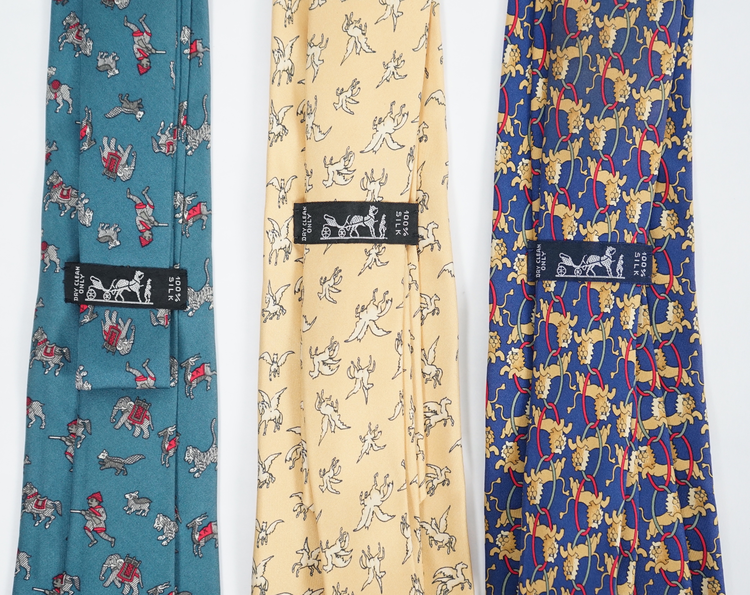 Three Hermès gentlemen's assorted patterned silk ties